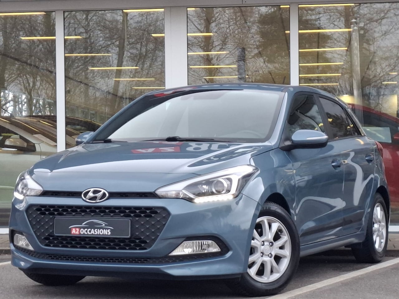 Hyundai i20 - 1.2 85pk (4 cilinder) Bluetooth/Cruise/All Season banden/PDC - AutoWereld.nl