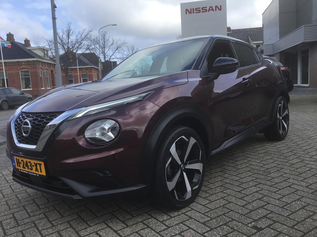 Nissan Juke - 1.0 DIG-T Tekna Sound&Ride 19" - AutoWereld.nl