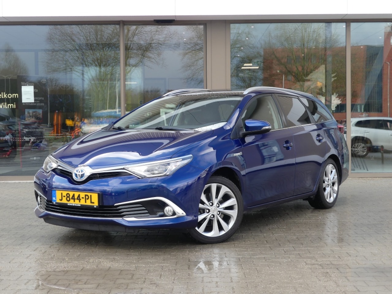 Toyota Auris Touring Sports - 1.8 Hybrid Executive | Panoramadak | Trekhaak - AutoWereld.nl