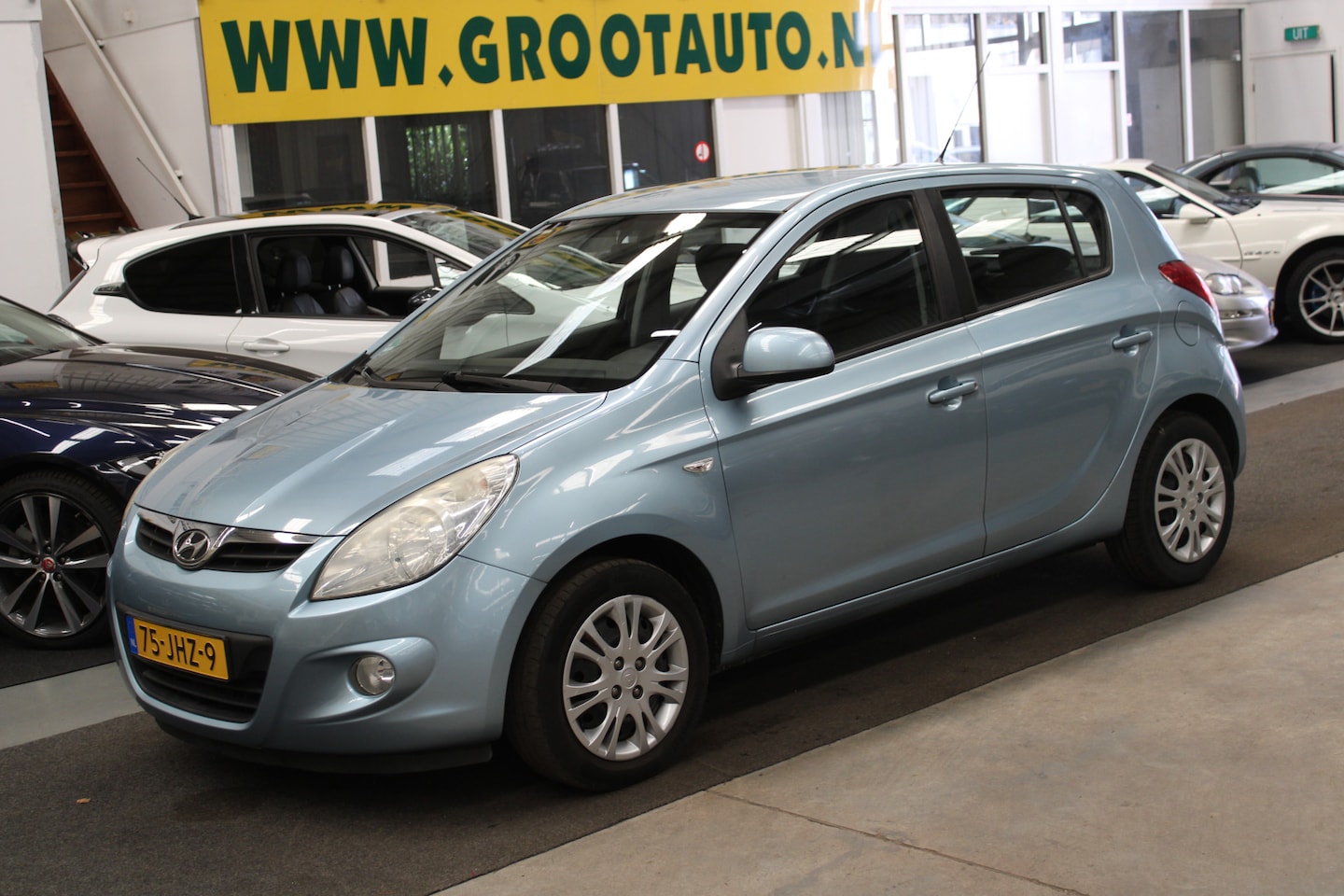 Hyundai i20 - 1.2i DynamicVersion 76.496km NAP, Airco, Isofix, Stuurbekrachtiging - AutoWereld.nl