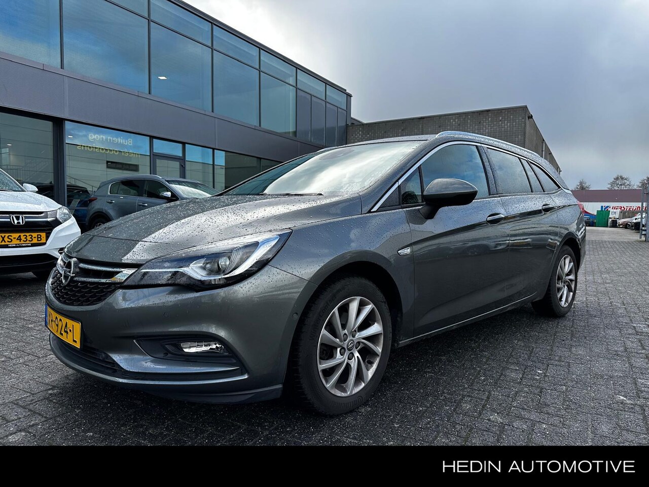 Opel Astra Sports Tourer - 1.4 Innovation AIRCO | NAVI | CARPLAY | LM VELGEN | CAMERA EN PDC | AGR STOELEN | INTELLIL - AutoWereld.nl