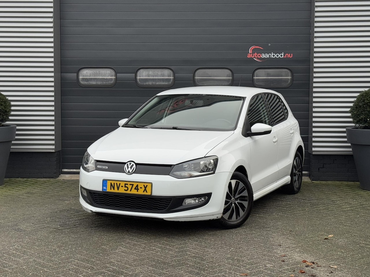 Volkswagen Polo - 1.0 BlueMotion Edition | Navigatie | Carplay | Parkeersensoren | Privacy Glass | Lichtmeta - AutoWereld.nl