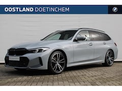 BMW 3-serie Touring - 318i High Executive M Sport Automaat / Panoramadak / Trekhaak / Sportstoelen / Stoelverwar