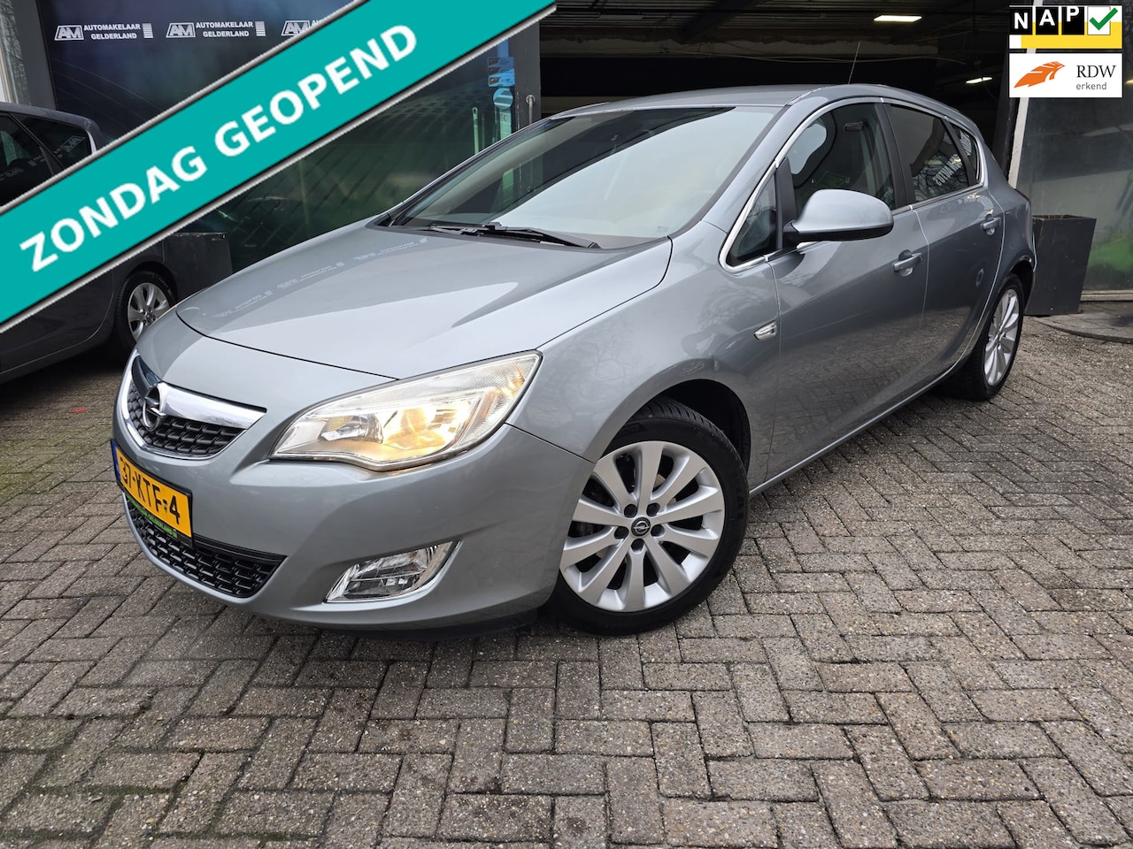 Opel Astra - 1.6 Cosmo | 12MND GARANTIE | AIRCO | CRUISE | LMV | TREKHAAK - AutoWereld.nl