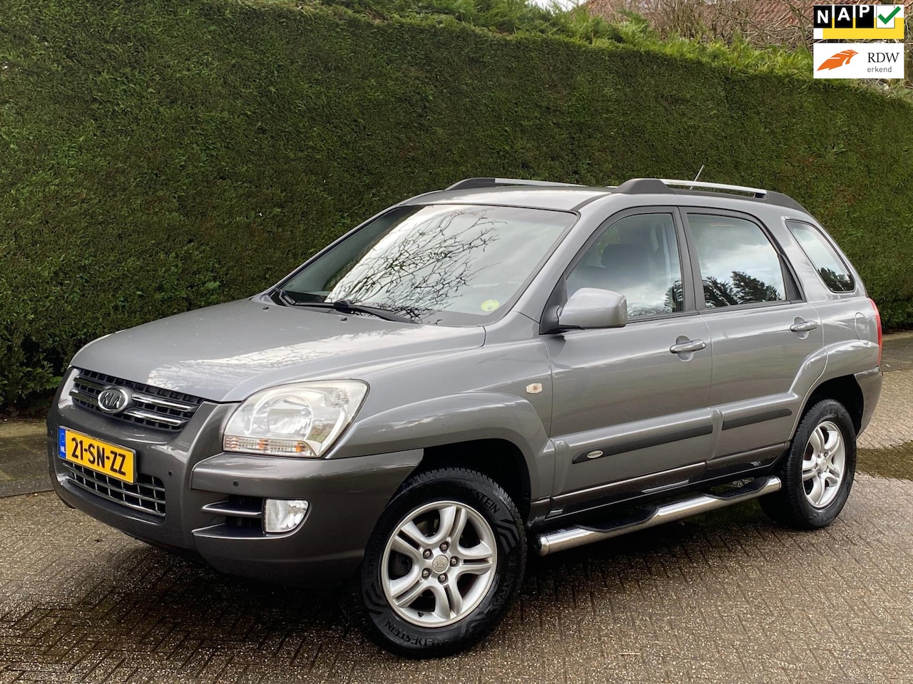 Kia Sportage - 2.0 CVVT RIJDT SUPER/LEER/PDC V+A/APK 4-2026!!! - AutoWereld.nl