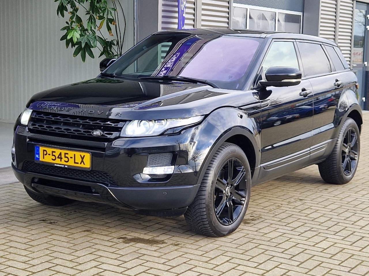 Land Rover Range Rover Evoque - 2.0 Si 4WD Prestige 2.0 Si 4WD Prestige - AutoWereld.nl