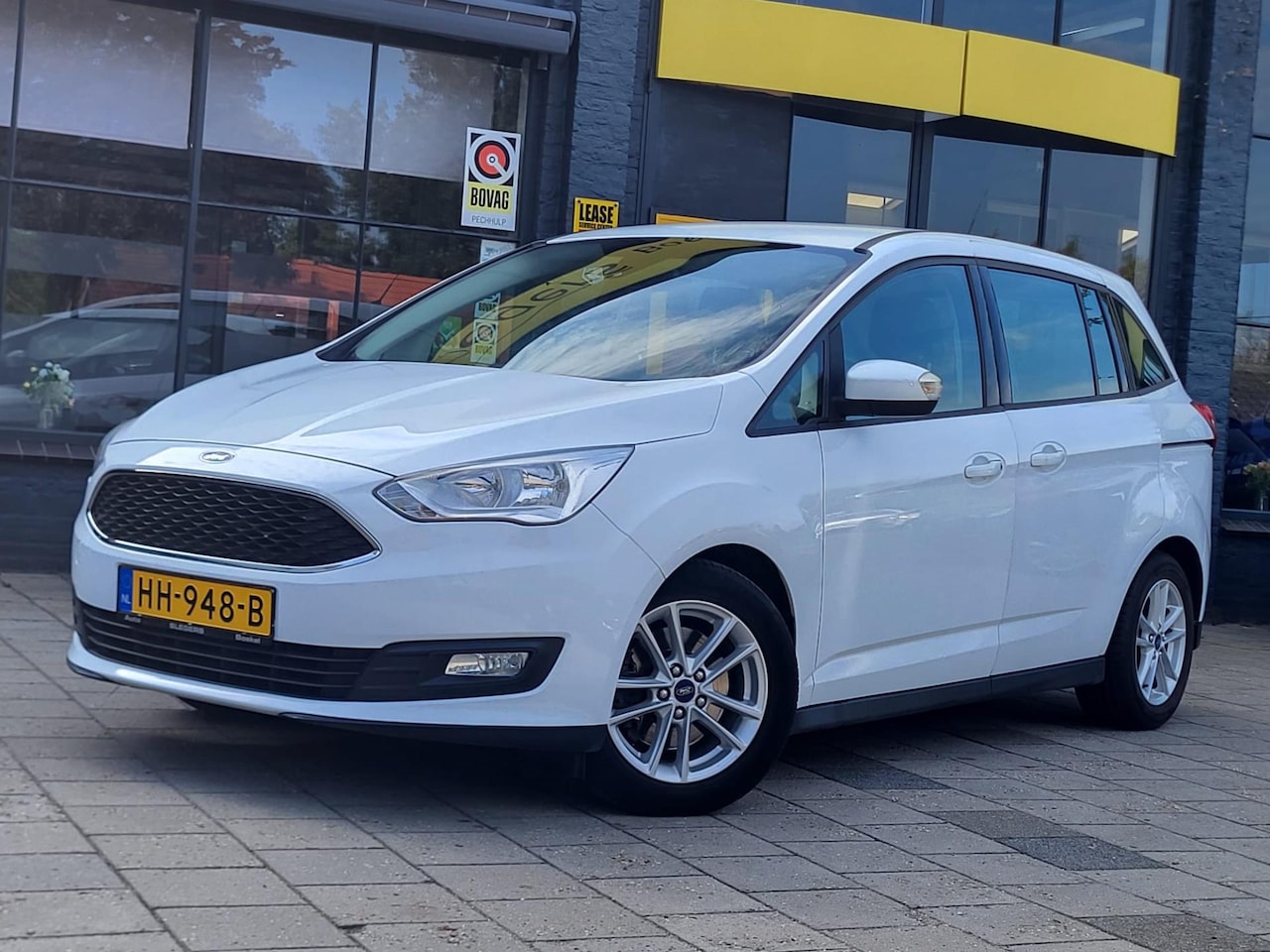 Ford Grand C-Max - 1.0 Trend | Stoelverwarming | Navigatie | Telefoon | Parkeersensoren - AutoWereld.nl