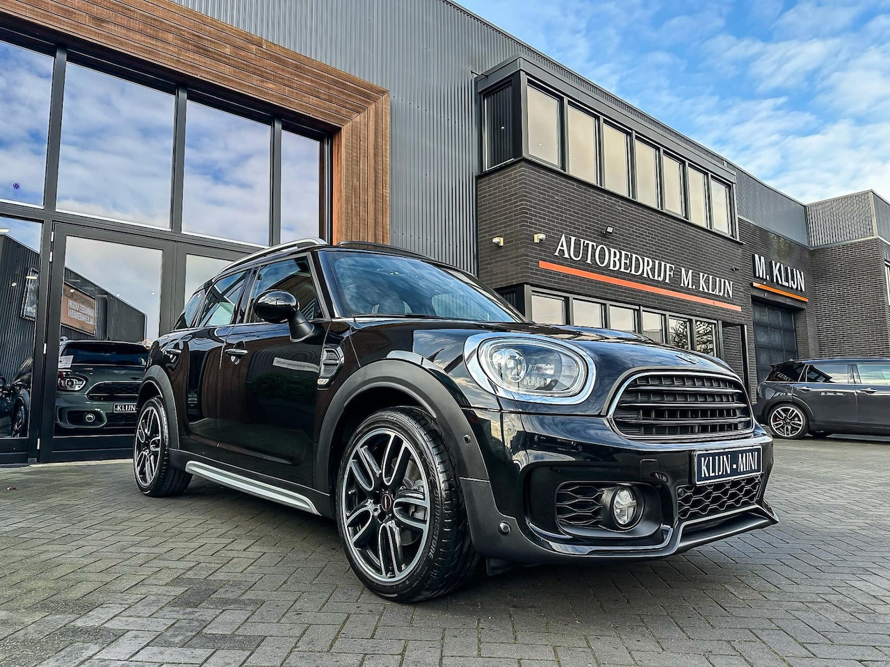 MINI Countryman - Mini 1.5 Cooper John Cooper Works aut/Leer/Pano/Camera/Navi/Hk/19"Jcw - AutoWereld.nl