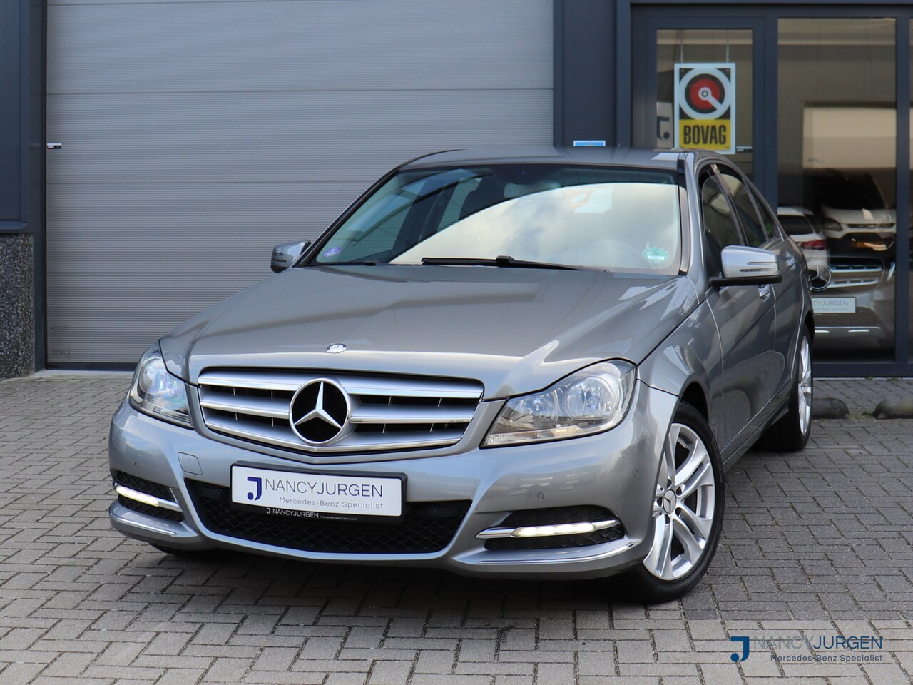 Mercedes-Benz C-klasse - 180 CGI | Avantgarde | Automaat 7G | Airco | Navi | Half Leder | Licht- & Zicht Pakket | P - AutoWereld.nl