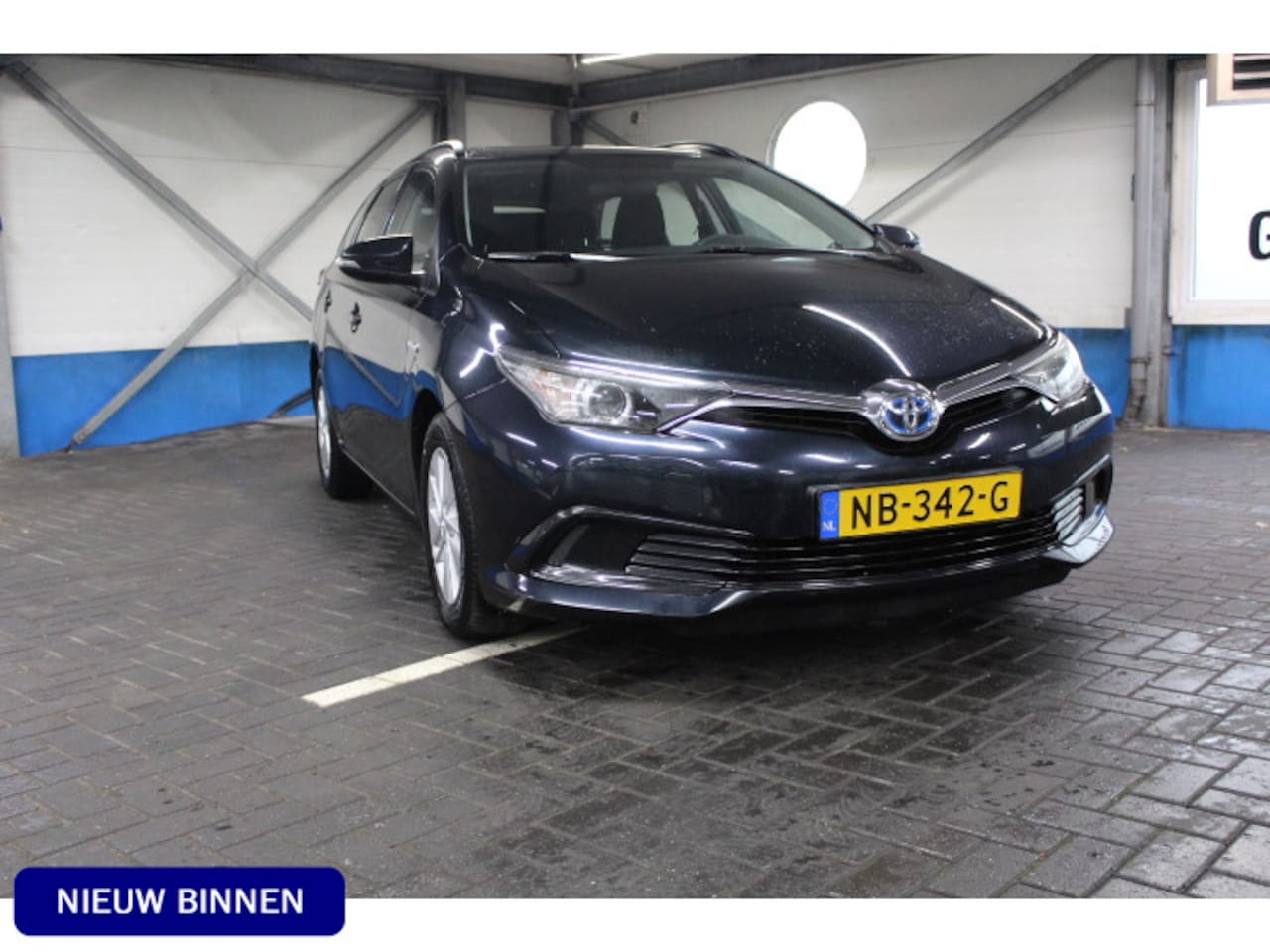 Toyota Auris Touring Sports - 1.8 Hybrid Business Camera Navi Climate LED - AutoWereld.nl