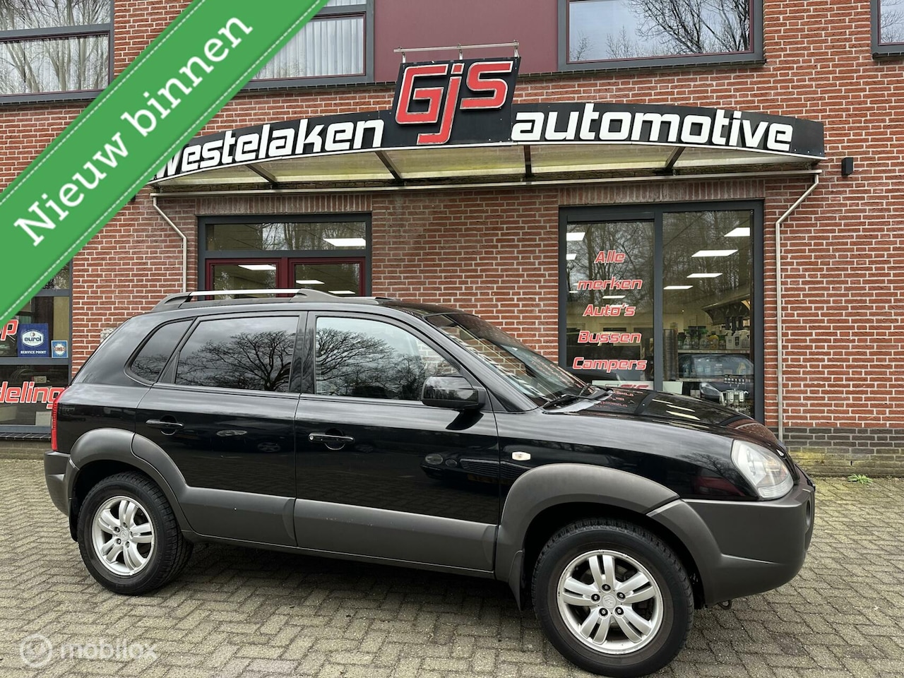 Hyundai Tucson - 2.0i Style 2.0i Style - AutoWereld.nl