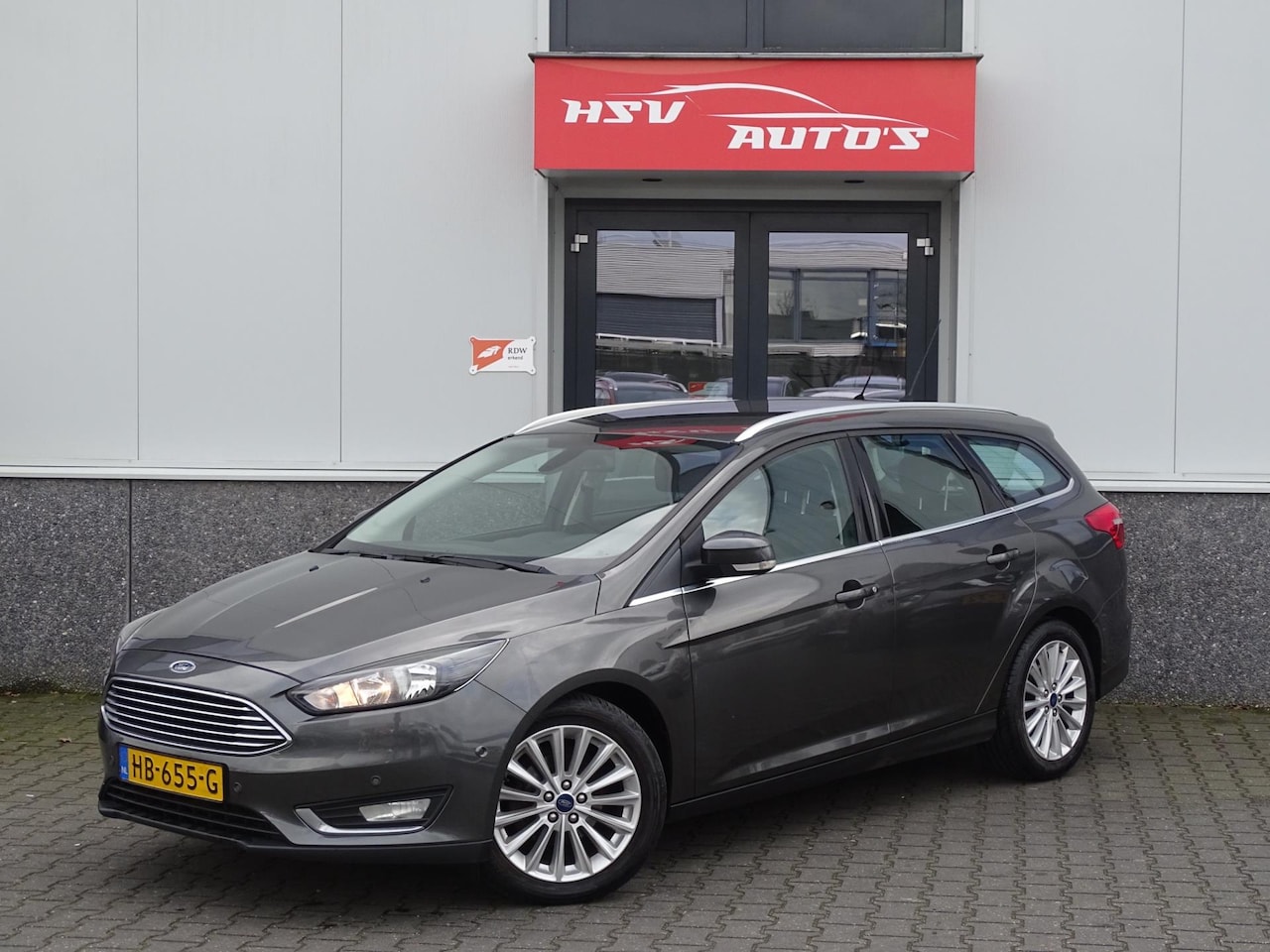 Ford Focus Wagon - 1.0 Titanium Edition navi LM airco - AutoWereld.nl