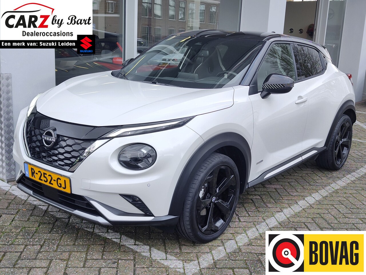 Nissan Juke - 1.6 HYBRID PREMIERE EDITION Verwarmde voorruit | Keyless | LED | Camera - AutoWereld.nl