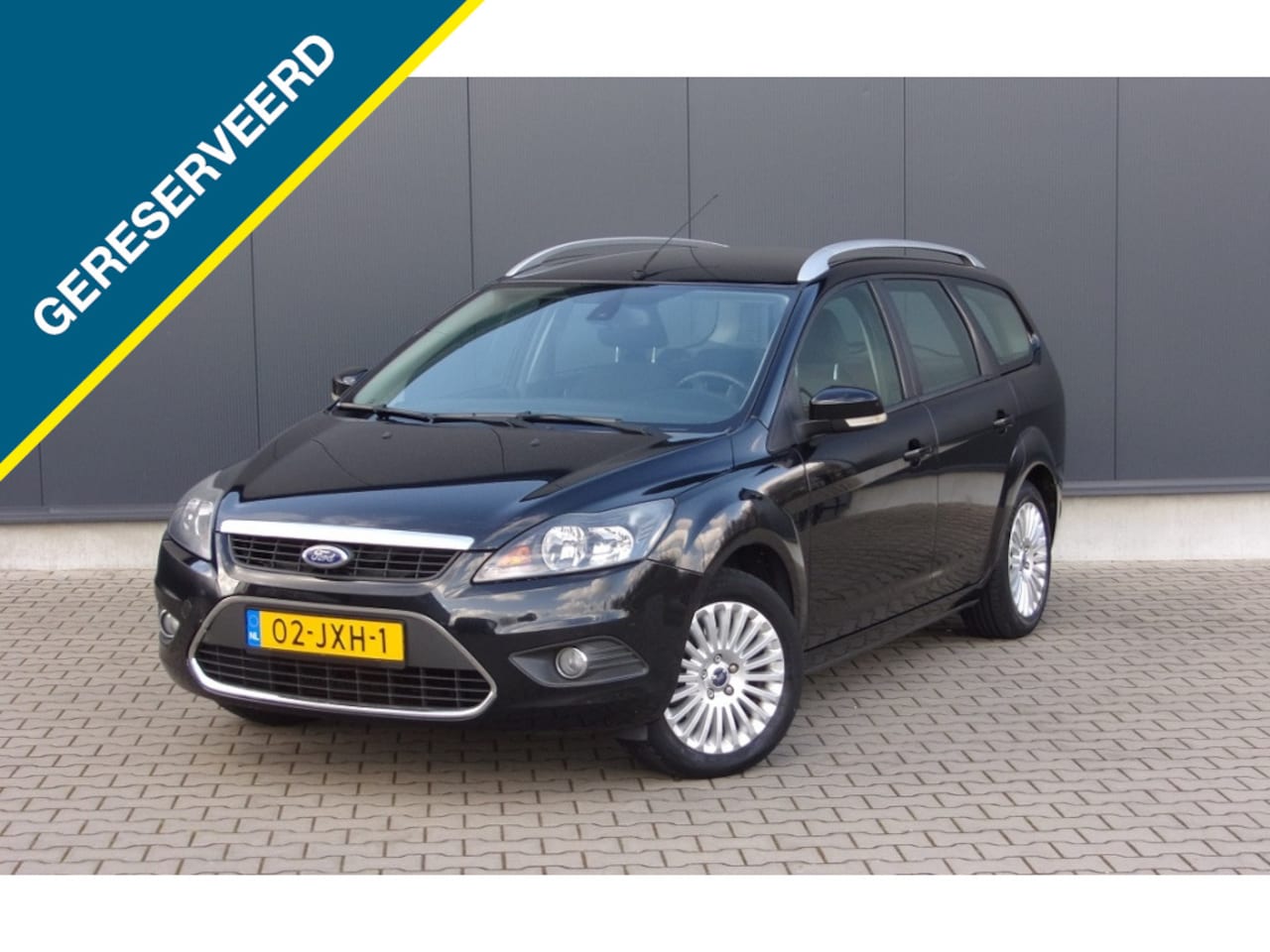 Ford Focus Wagon - 1.8 Limited | LEES TEKST AUB | NAVI | TREKHAAK - AutoWereld.nl