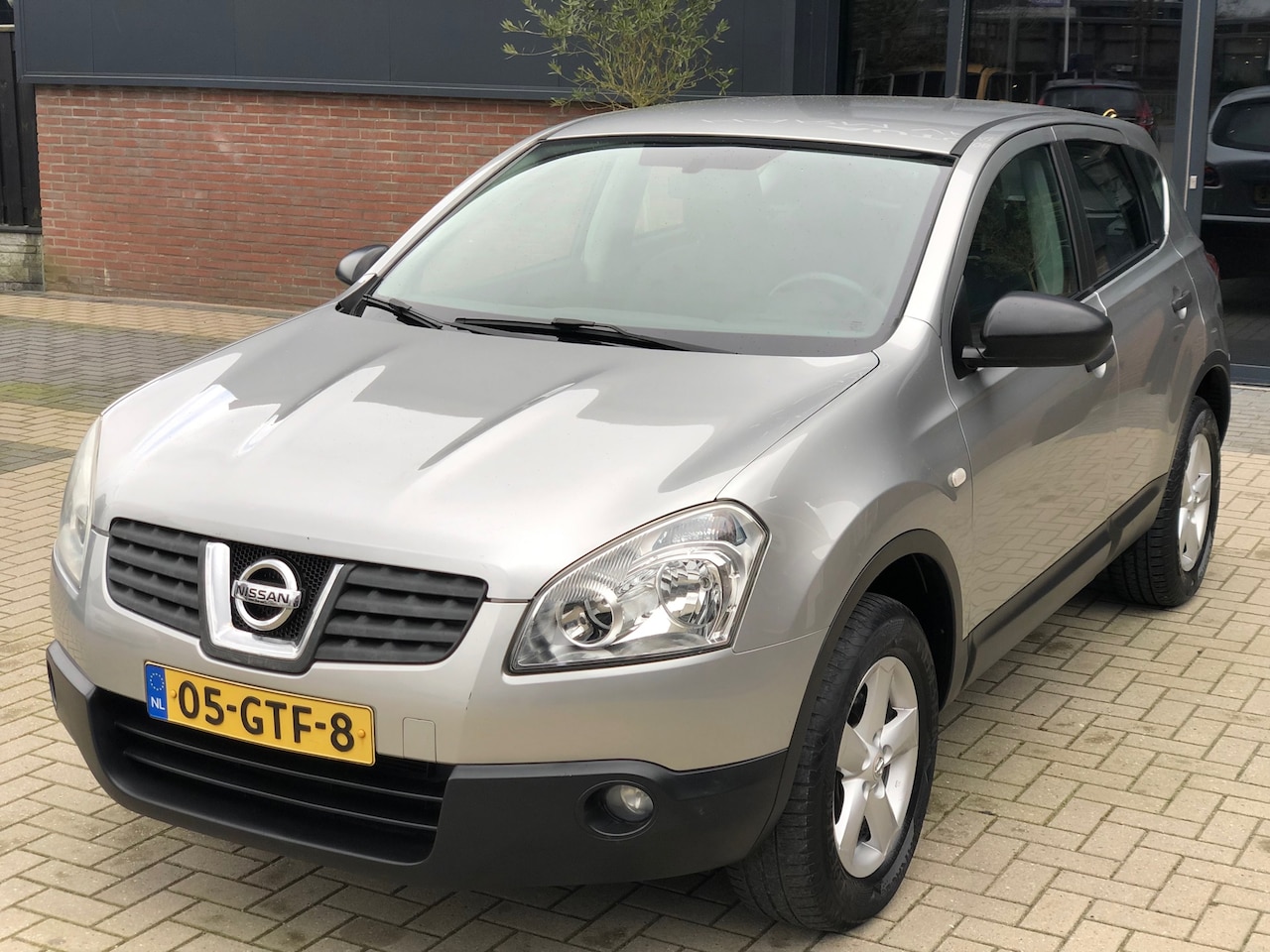 Nissan Qashqai - 1.6 Visia AIRCO CRUISE PDC LM VELGEN TREKHAAK - AutoWereld.nl