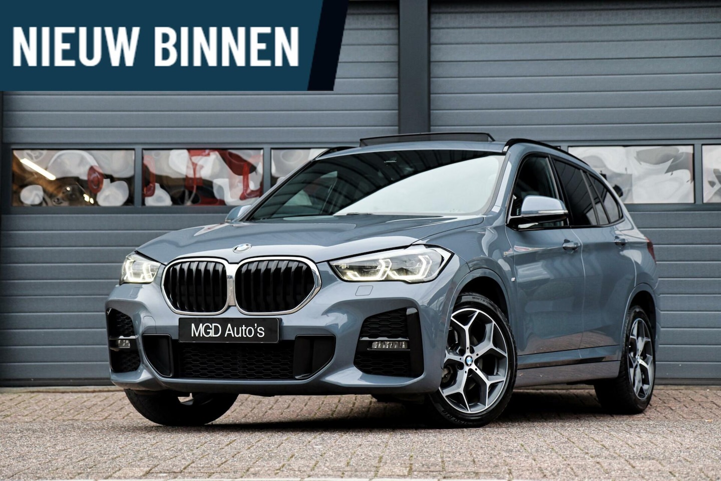 BMW X1 - sDrive18i M-Sport M-Pakket /LED/PANODAK/GROOT NAVI/STOELVERW./TREKHAAK/ACC/LEDER! - AutoWereld.nl