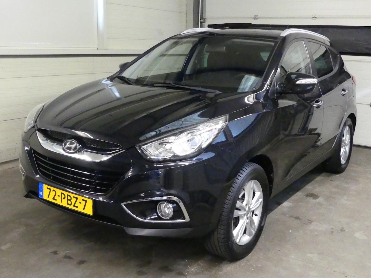 Hyundai ix35 - 2.0i Style - Half Leer - Trekhaak - Cruise Control - AutoWereld.nl