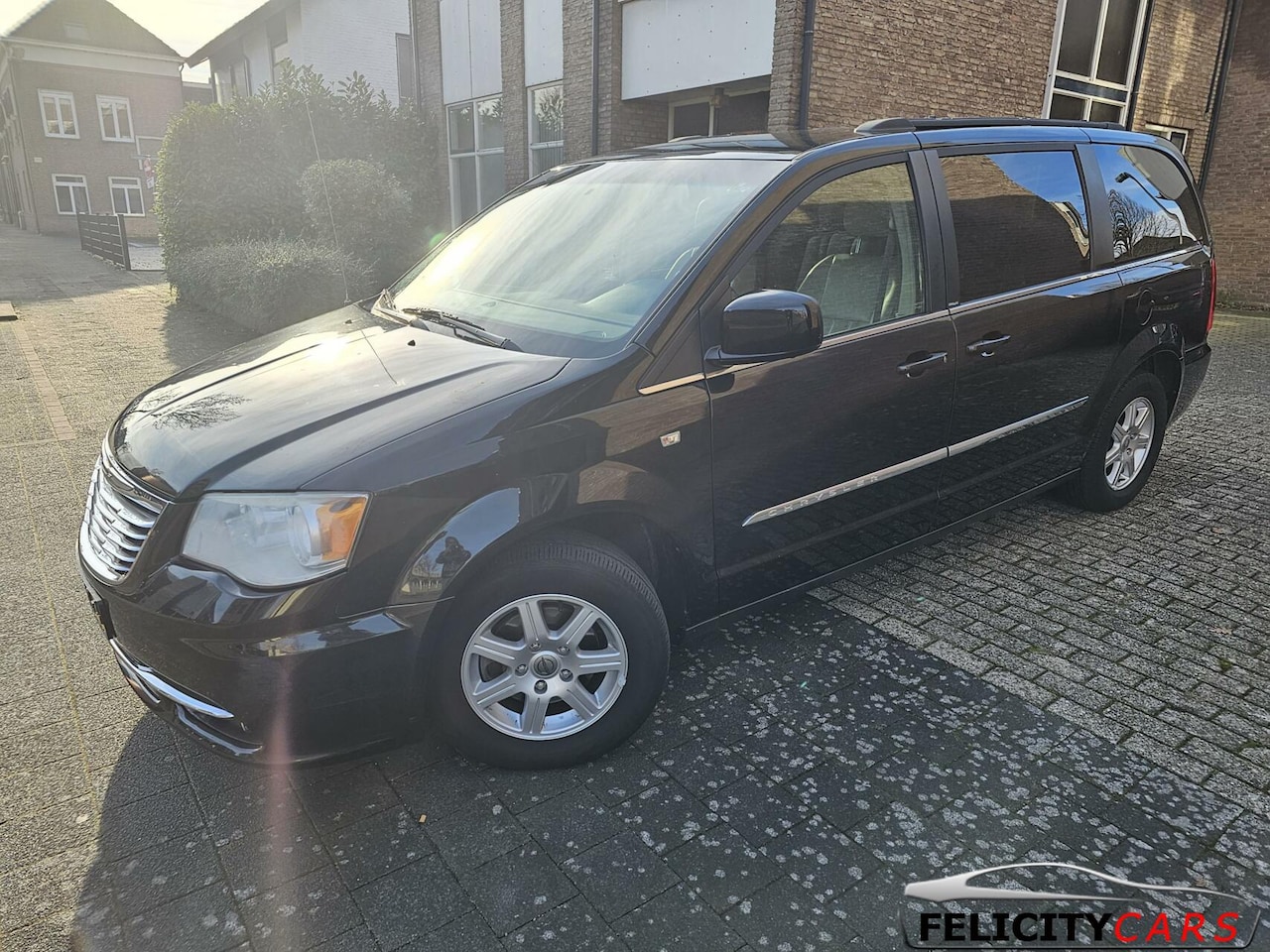 Chrysler Town and Country - 3.6 V6 nieuw model leer dvd navi - AutoWereld.nl