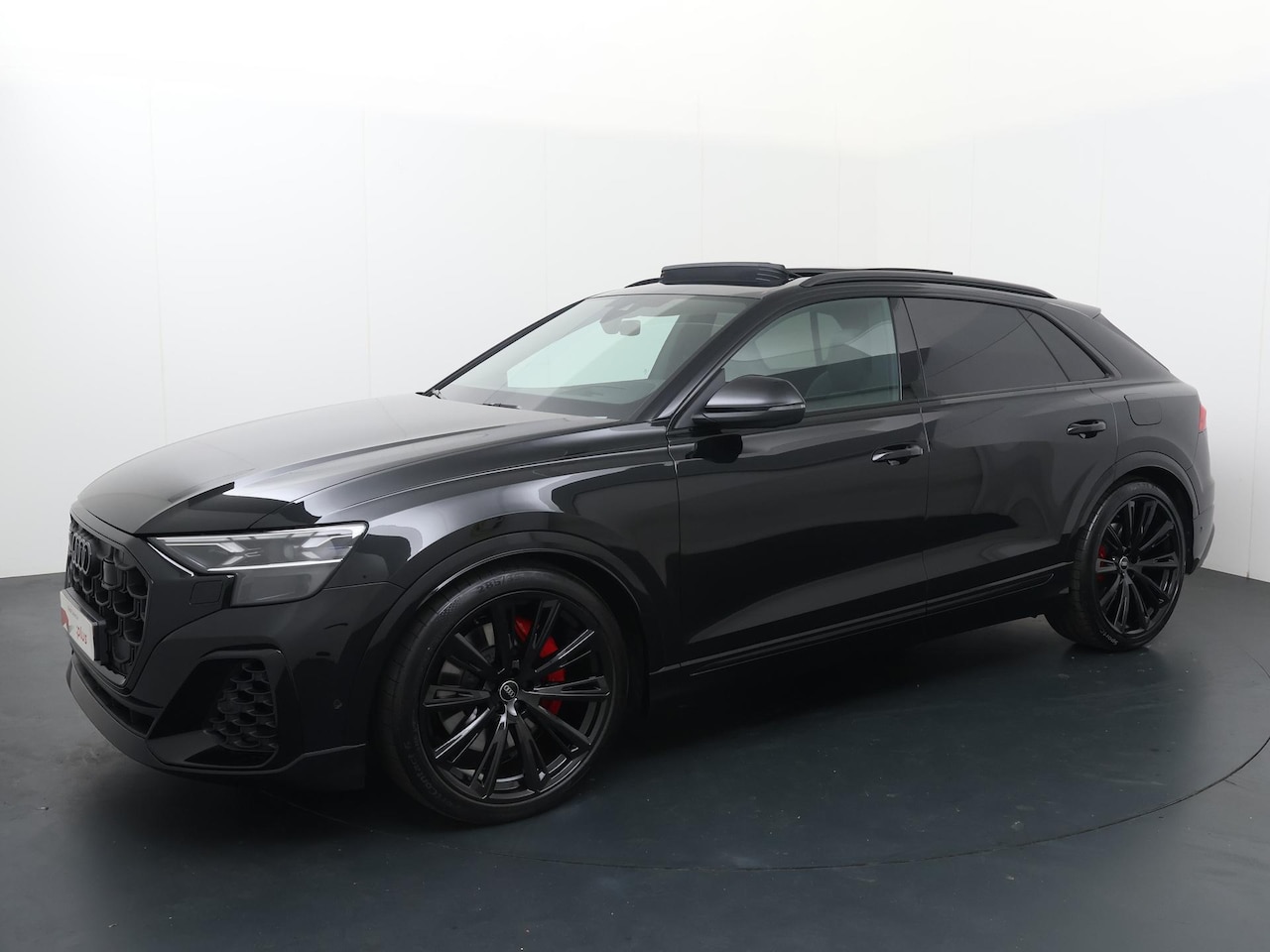 Audi Q8 - 60 TFSI e quattro | 490 PK |  S-Line | Lederen bekleding Volcano met ruit | Panoramadak | - AutoWereld.nl