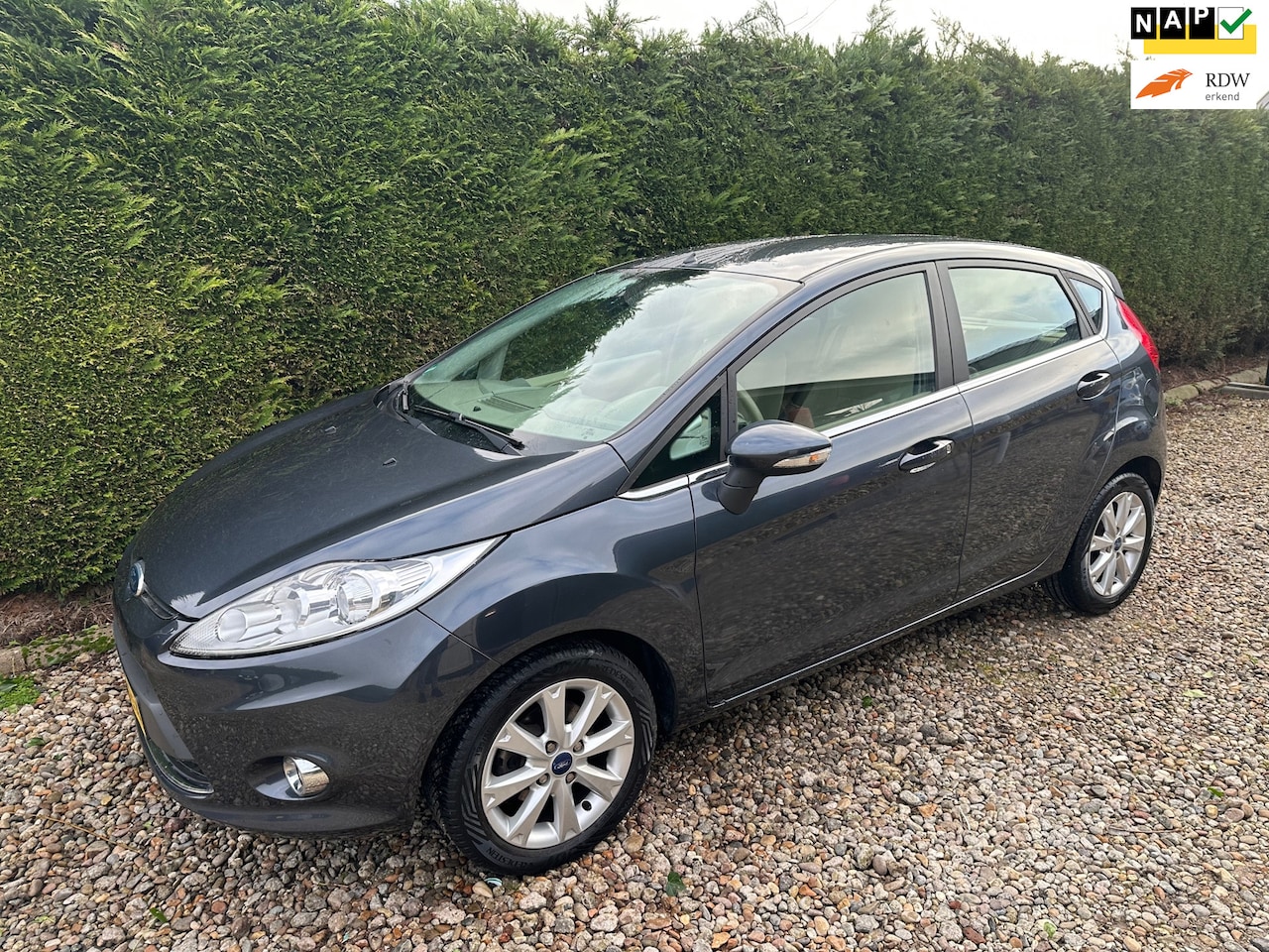 Ford Fiesta - 1.25 Ghia Climate/Cruise Control 97DKM NAP - AutoWereld.nl