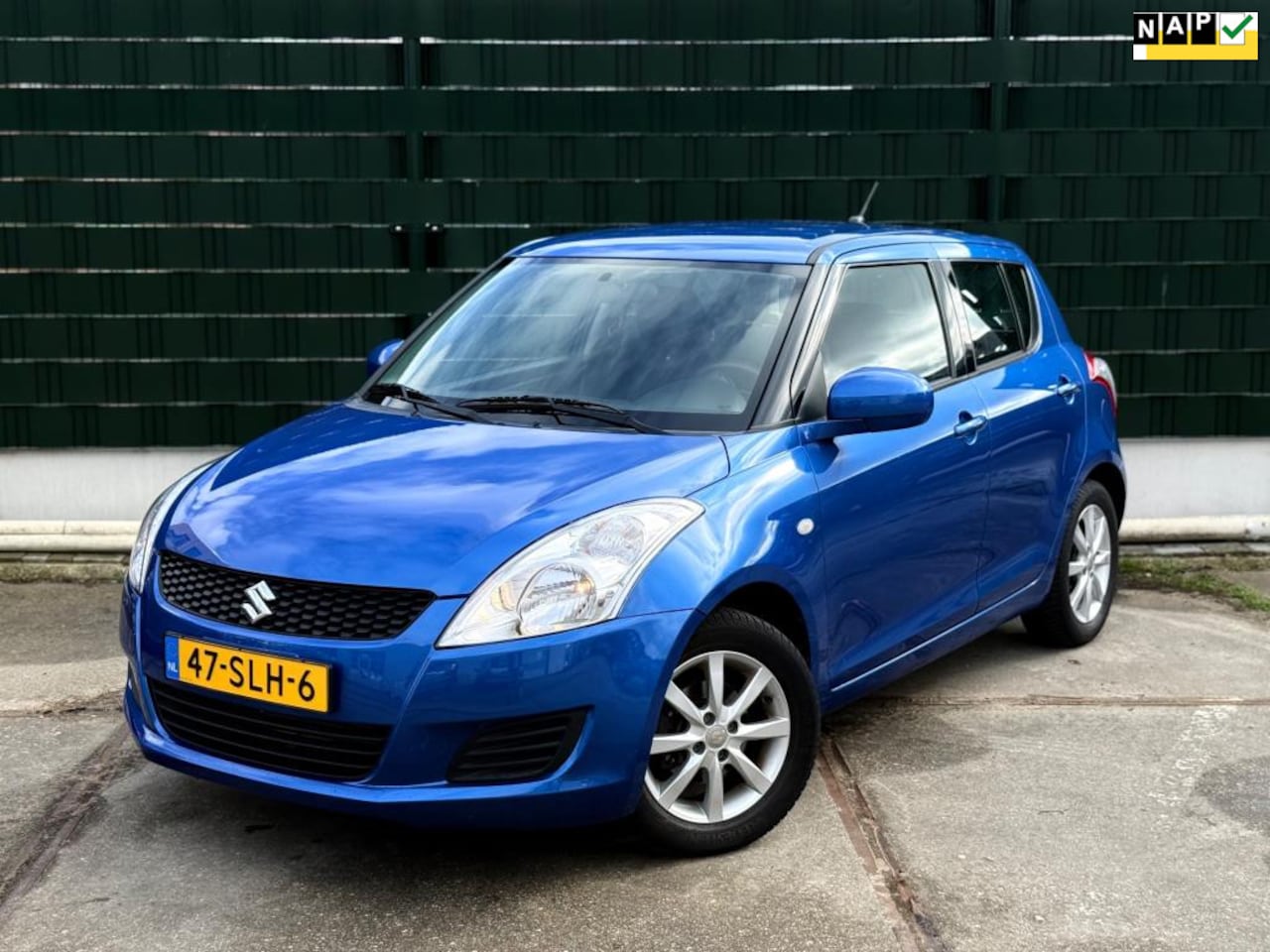 Suzuki Swift - 1.2 Comfort EASSS Airco Stoelverwarming - AutoWereld.nl