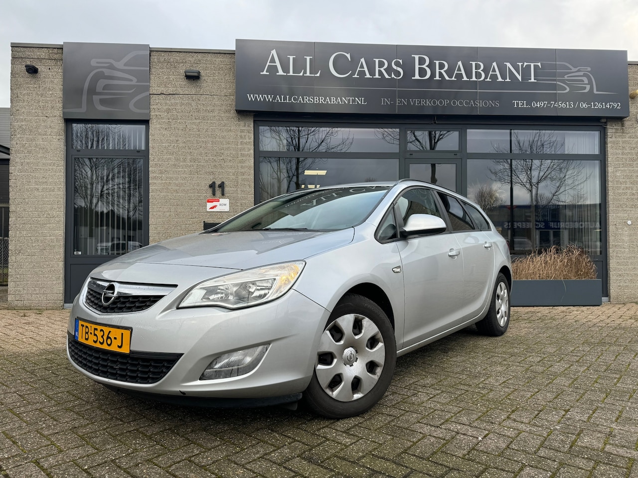 Opel Astra Sports Tourer - 1.4 Turbo Anniversary Edition/ navigatie/ nieuwe apk / trekhaak - AutoWereld.nl