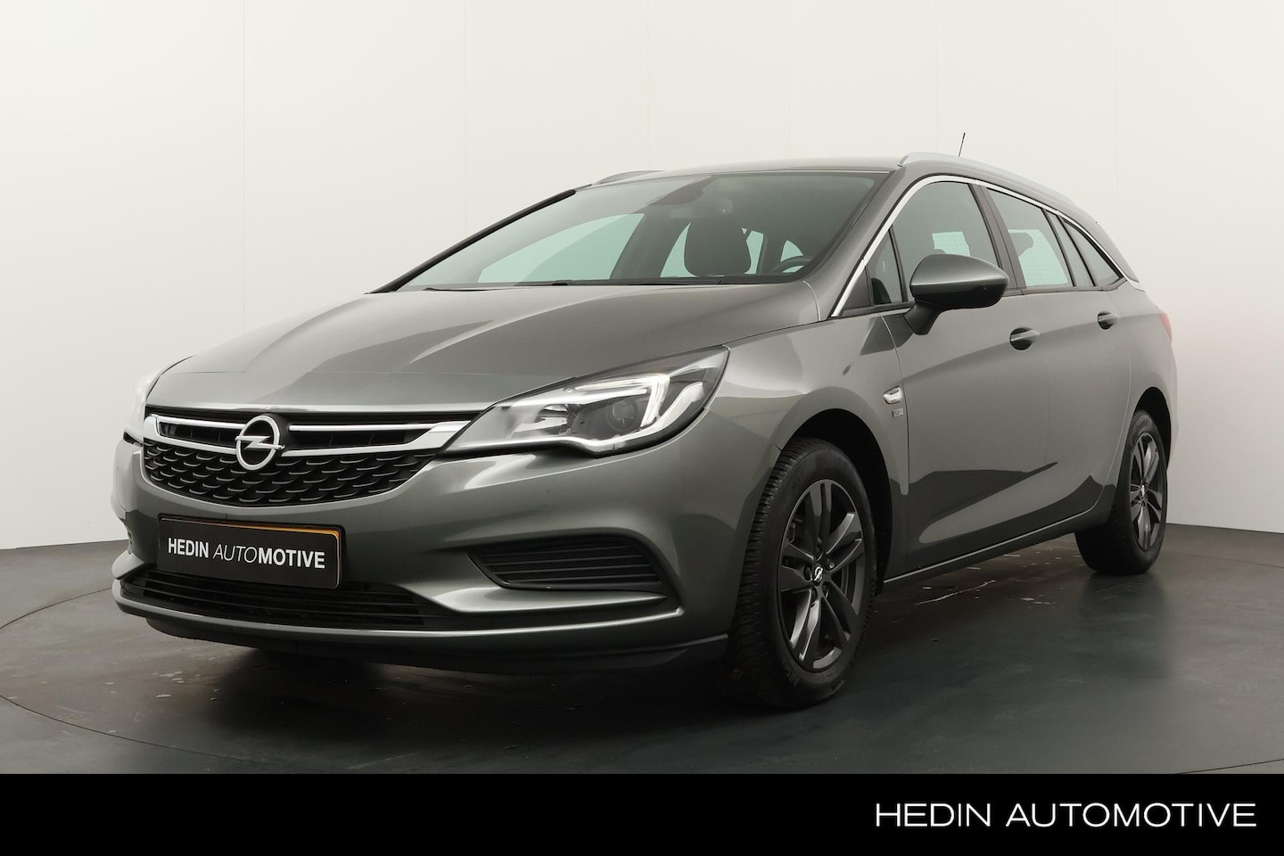 Opel Astra Sports Tourer - 1.0 105PK Turbo 120 Jaar Edition | Navigatie | Airco | Cruise control | Apple Carplay/Andr - AutoWereld.nl