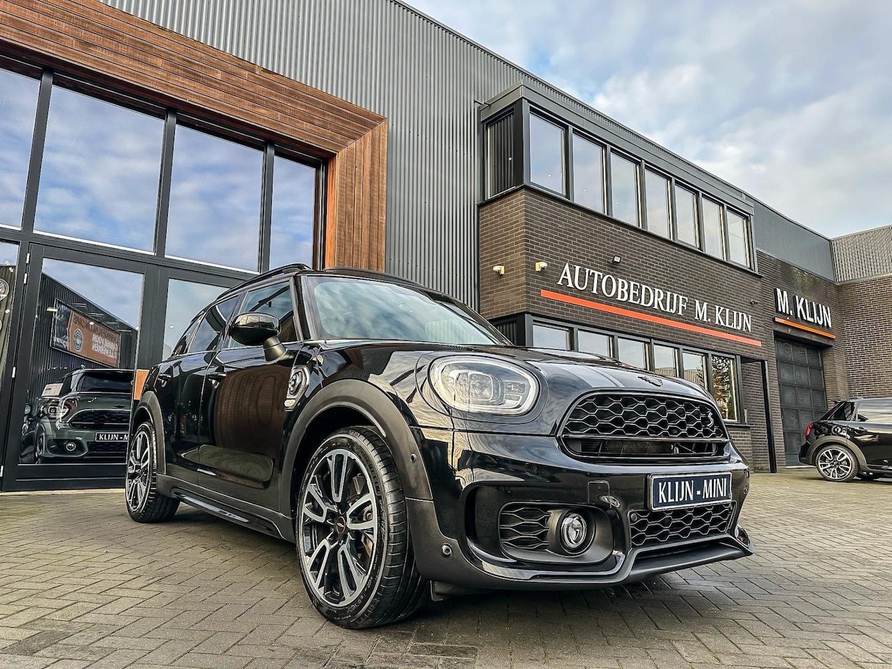 MINI Countryman - Mini 2.0 Cooper S E ALL4 John Cooper Works 220pk/Pano/Camera/Memory stoelen/Btw - AutoWereld.nl