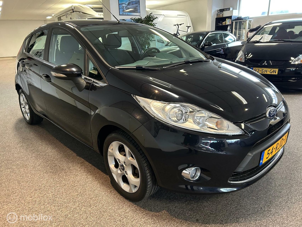 Ford Fiesta - 1.4 Ghia + Launch Pakket - AutoWereld.nl