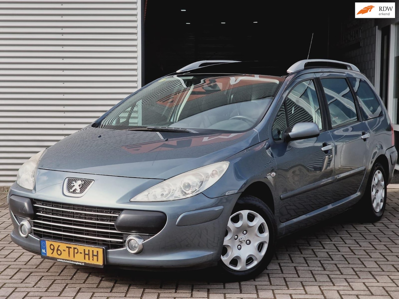 Peugeot 307 SW - 1.6-16V 7 PERS.|AIRCO|TREKHAAK|PANO - AutoWereld.nl