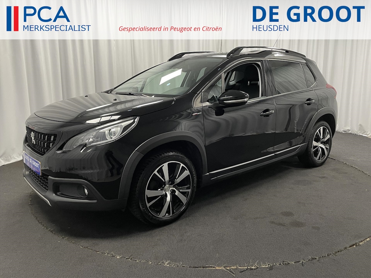 Peugeot 2008 - GT-Line 110pk Navi+Carplay | Camera | Half leder | Grip control - AutoWereld.nl