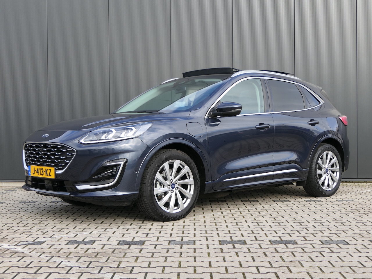 Ford Kuga - 2.5 PHEV Vignale | Leder | Panoramadak | B&O | Head-Up | Adaptive Cruise | LED | Winterpac - AutoWereld.nl