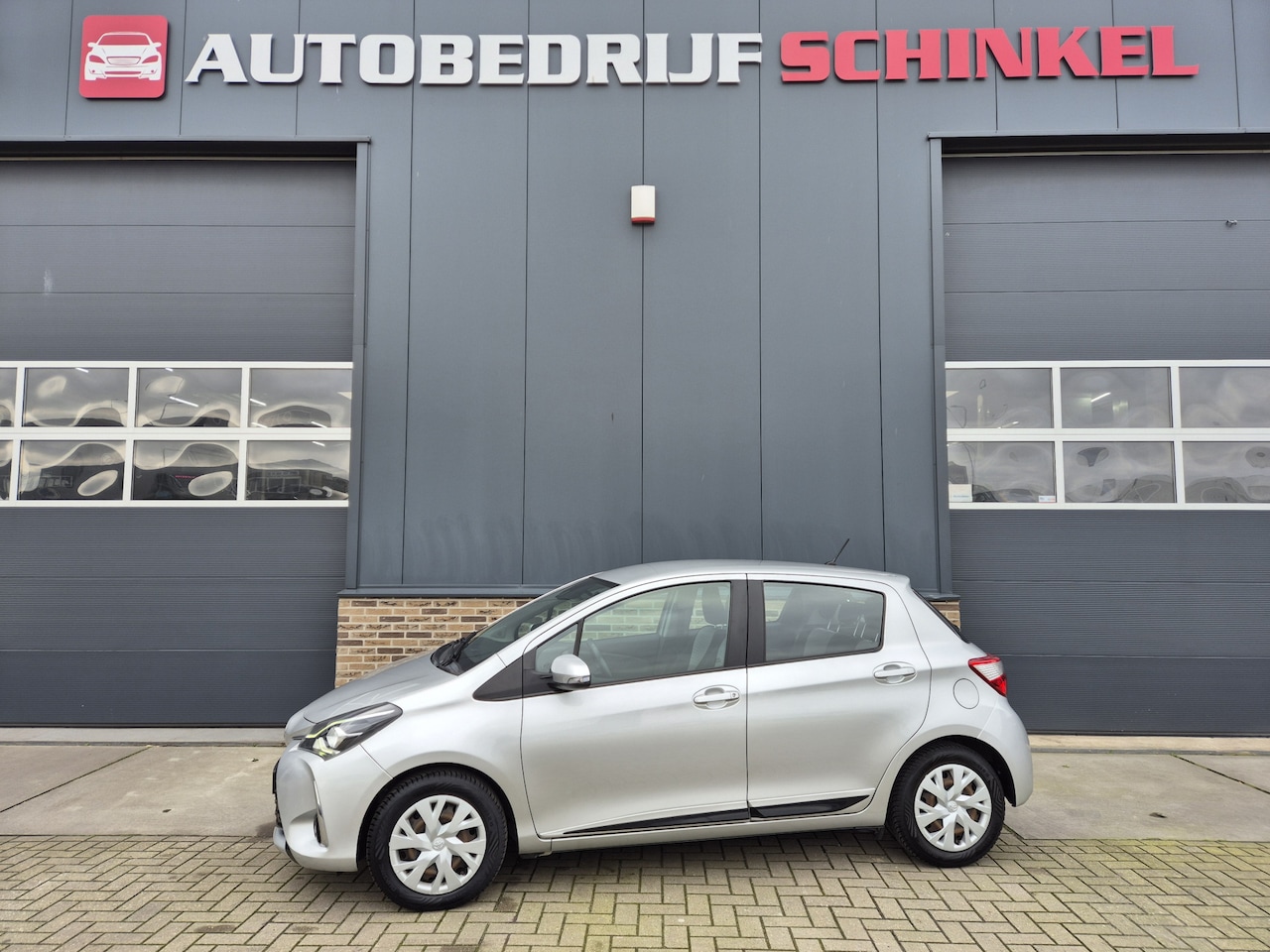 Toyota Yaris - 1.5 Hybrid LED,TREKHAAK,CRUISE CONTROL,CAMERA - AutoWereld.nl