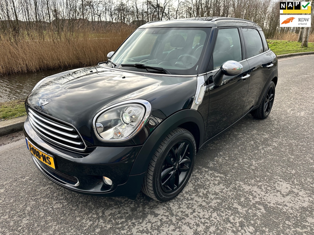 MINI Countryman - Mini 1.6 Cooper BLACK EDITION AUTOMAAT/XENON/PANORAMADAK/LEDER/NAVIGATIE/AFNEEMBARE TREKHA - AutoWereld.nl