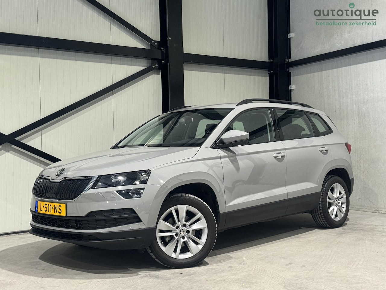 Skoda Karoq - 1.5 TSI ACT Business Aut. | carplay | camera | stoelverwarming | - AutoWereld.nl