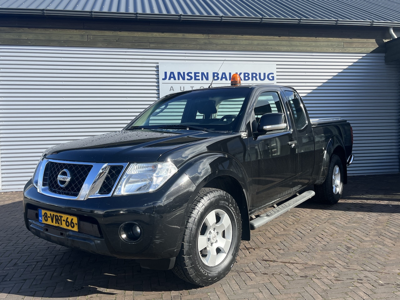 Nissan Navara - 2.5 dCi SE King Cab 4X4 - AutoWereld.nl