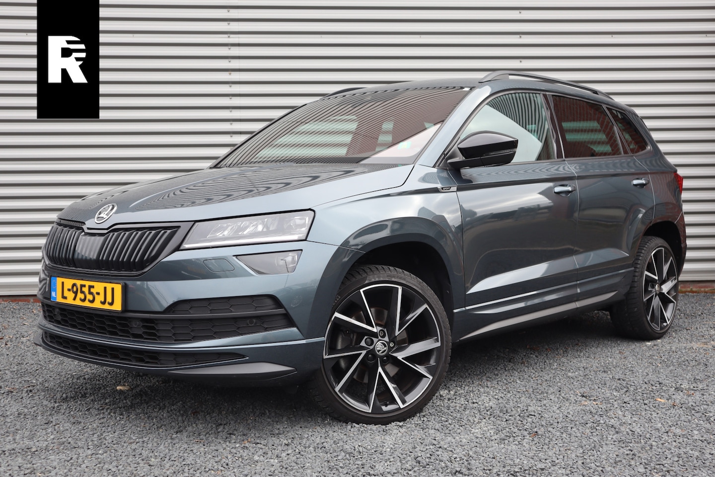 Skoda Karoq - 1.5 TSI Sportline Business Digital Dash / Canton / 19inch / Trekhaak / Stoelverwarming / - AutoWereld.nl