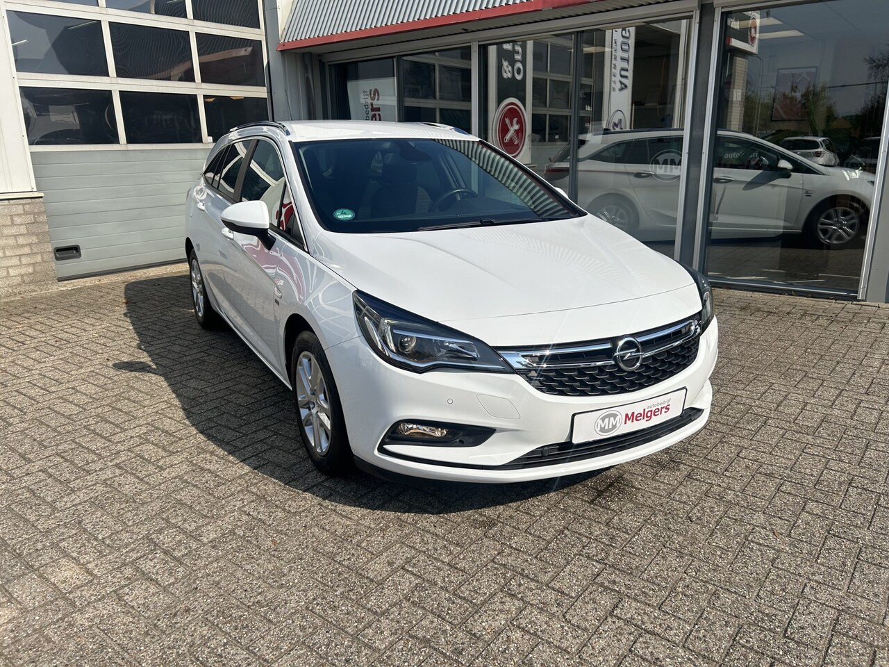 Opel Astra Sports Tourer - 1.0 Turbo 120 Jaar Edition 1.0 Turbo 120 Jaar Edition - AutoWereld.nl