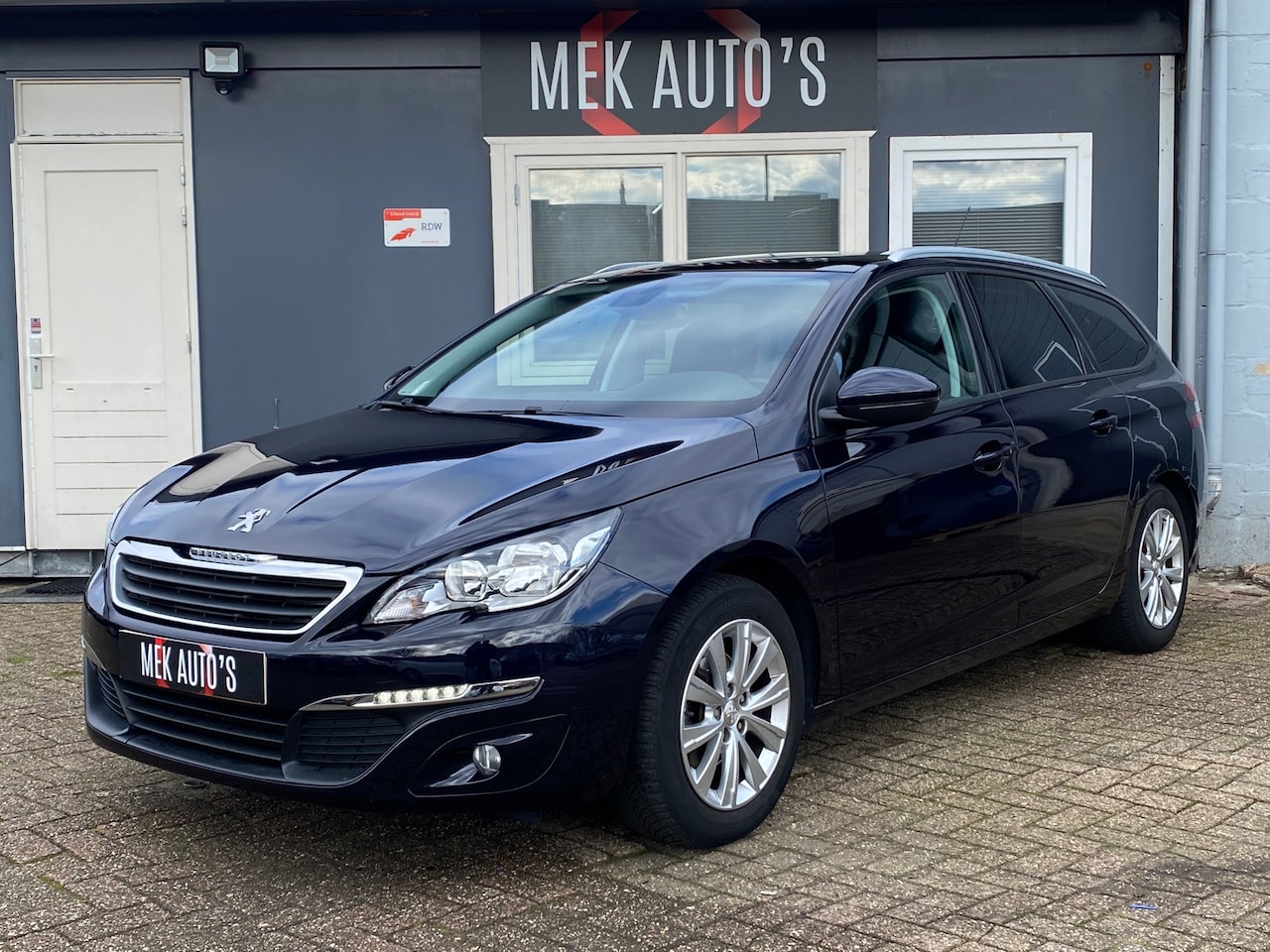 Peugeot 308 SW - 1.2 PureTech Style|Pano|Navi|Cruise|D-Riem VV| - AutoWereld.nl