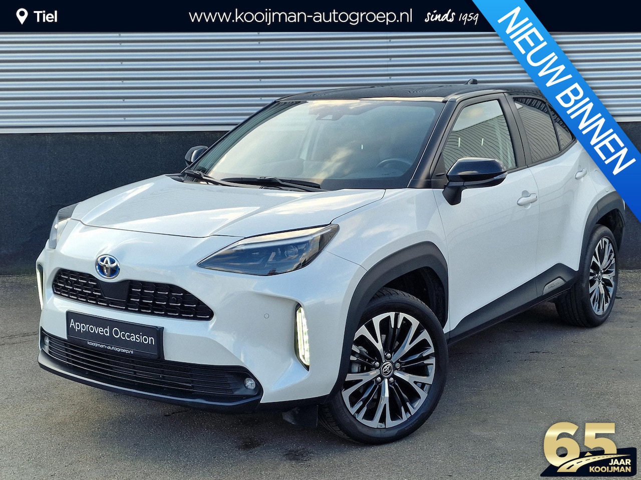 Toyota Yaris Cross - 1.5 Hybrid Adventure CVT-Automaat Bi-Tone Parelmoer met zwart dak | Dodehoekdetectie | Ach - AutoWereld.nl