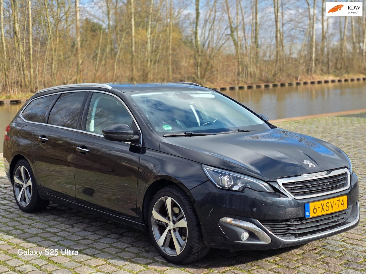 Peugeot 308 SW - 1.2 e-THP Première airco cruis control trekhaak - AutoWereld.nl