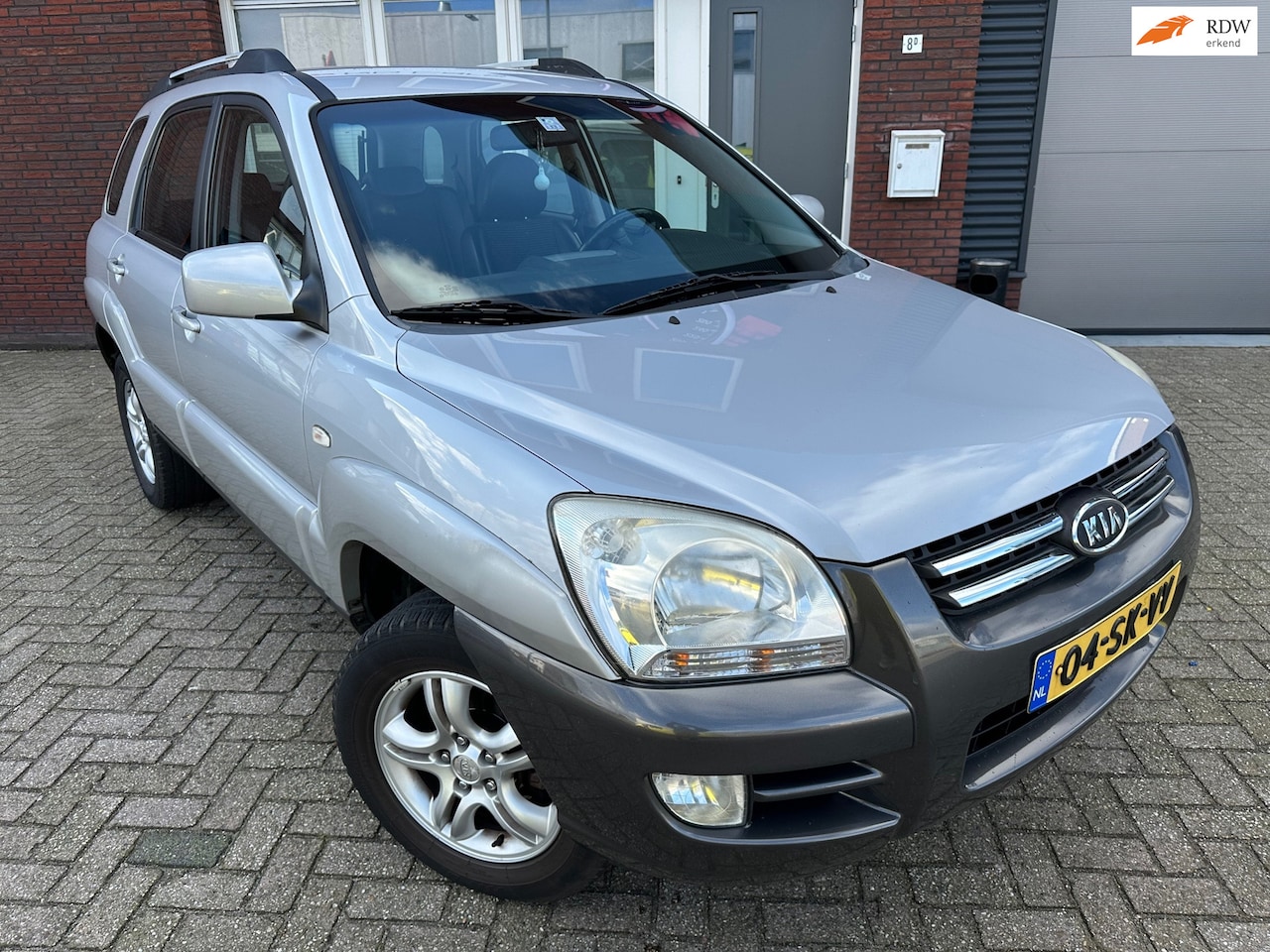 Kia Sportage - 2.0 CVVT Executive / Leder / Clima / Cruise / NAP - AutoWereld.nl