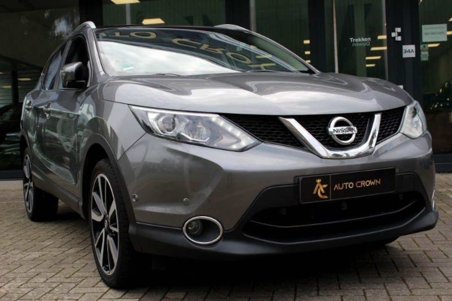 Nissan Qashqai - 1.2 Tekna Leer + pano. dak luxe model! - AutoWereld.nl