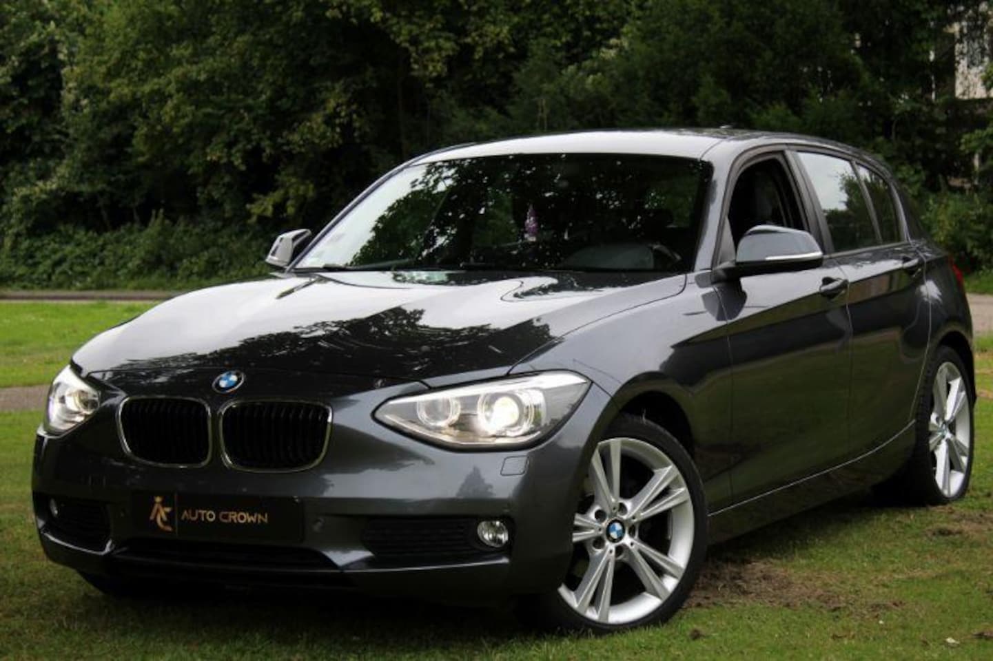 BMW 1-serie - 116i Bussines Leer + navi 92.883km! - AutoWereld.nl