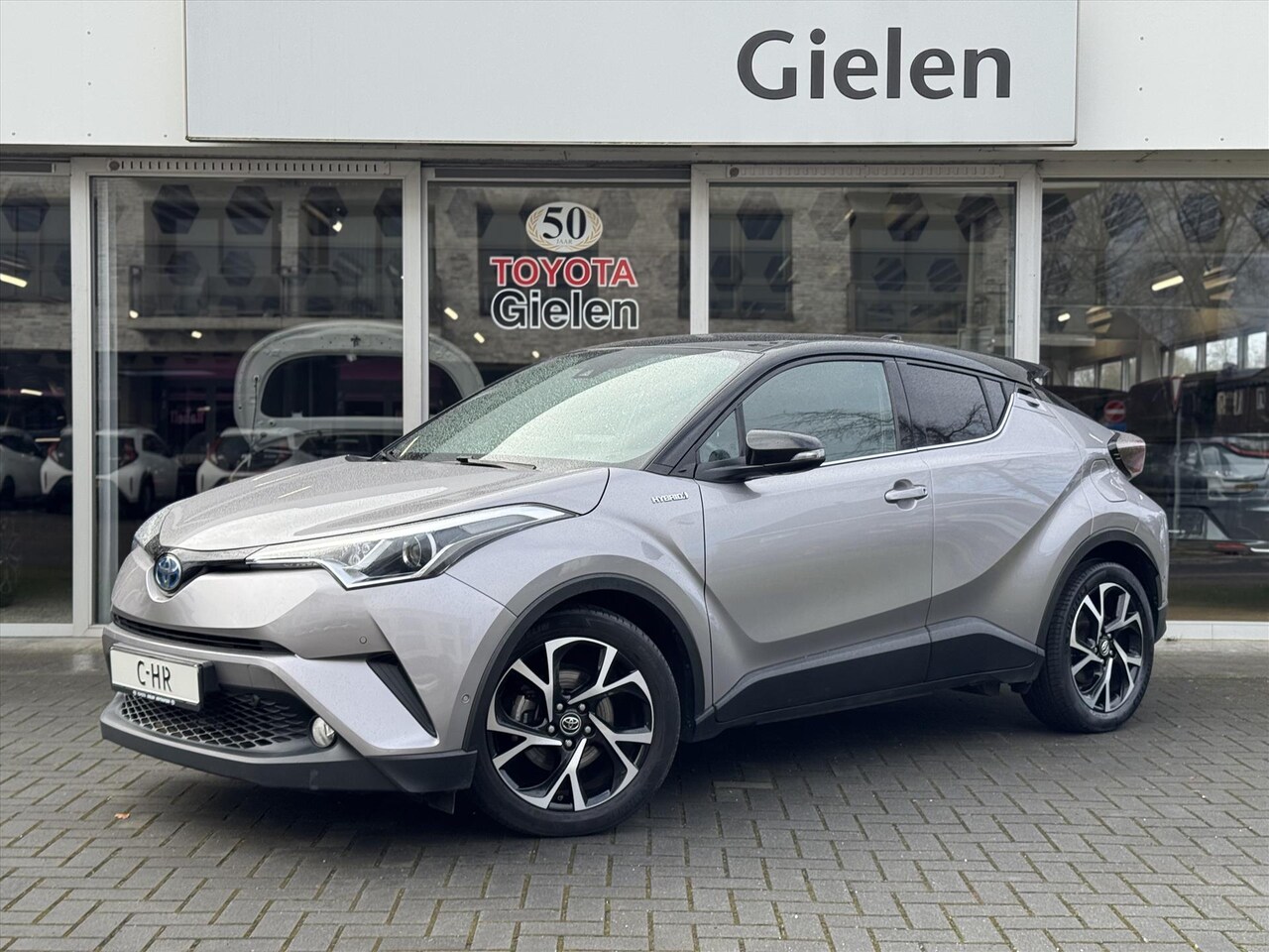 Toyota C-HR - 1.8 Hybrid Style | Eerste eigenaar, Leer, JBL, Dodehoekherkenning, Parkeersensoren, Keyles - AutoWereld.nl