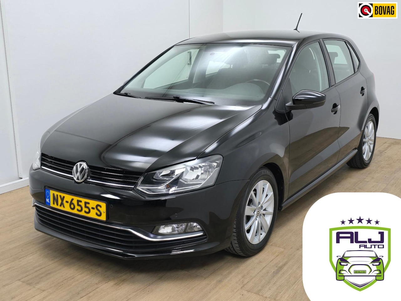 Volkswagen Polo - Occasion 1.2 TSI Comfortline Business R met carplay en cruisecontrol | Volle auto! | Tweed - AutoWereld.nl