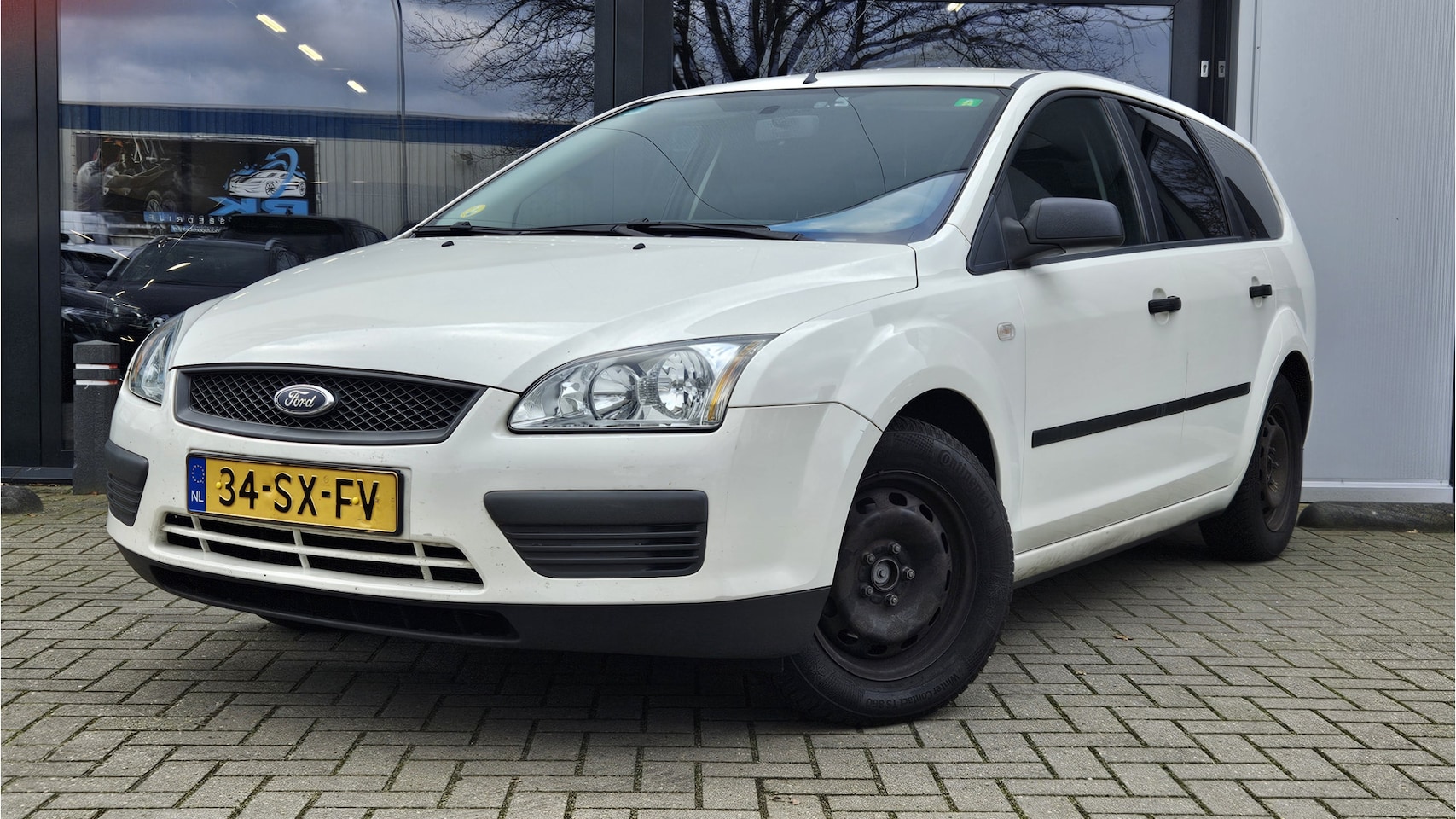 Ford Focus Wagon - 1.6-16V Champion >>NIEUWE APK<< + CRUISE + AIRCO + DUBBELE WIELEN - AutoWereld.nl