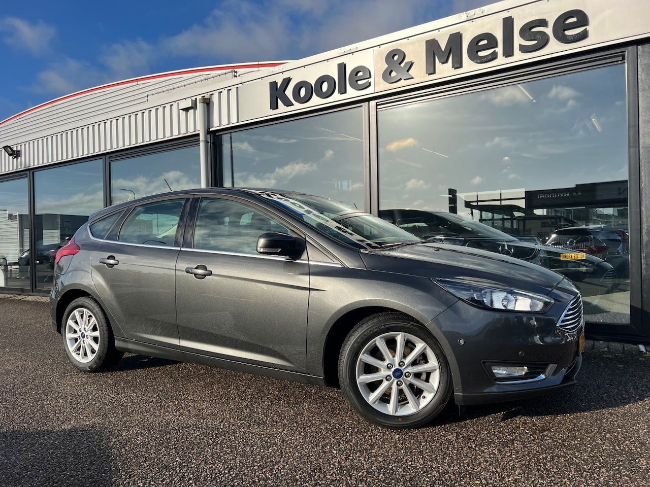 Ford Focus - 1.0 EcoBoost Titanium 1.0 EcoBoost 125pk 5-deurs Titanium - AutoWereld.nl