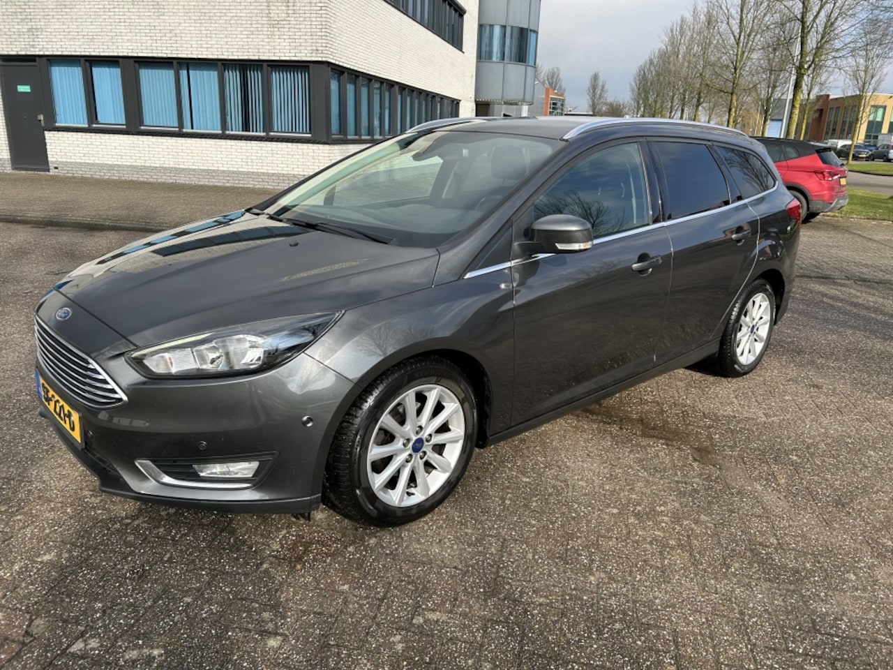 Ford Focus Wagon - 1.0 Titanium 125PK NAVI CRUISE STOELVW STUURVW. - AutoWereld.nl