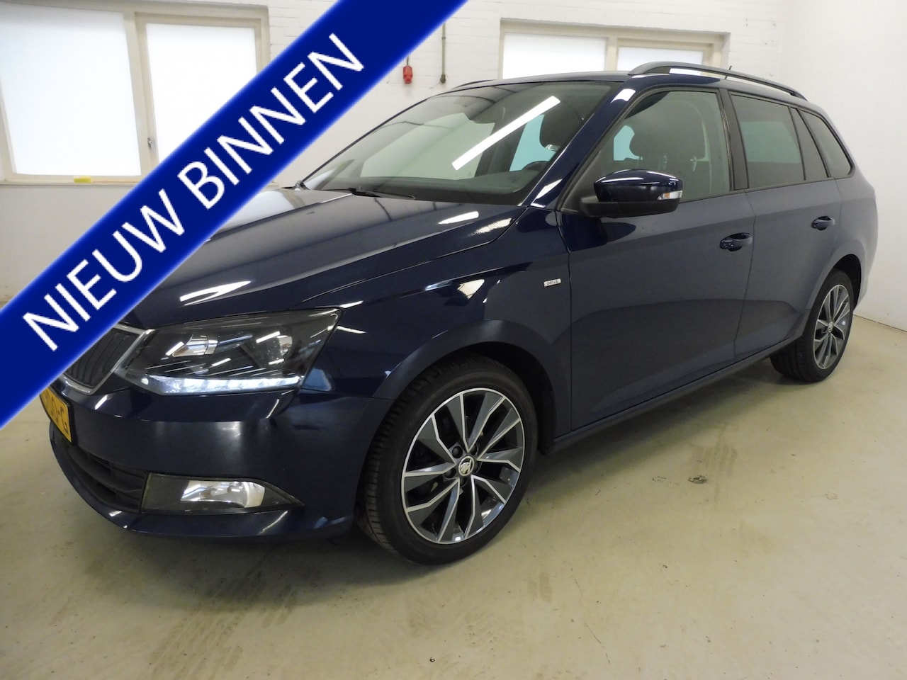 Skoda Fabia Combi - 1.4 TDI Drive Trekhaak | Cruise | Navi | LED | LMV 16"| NL auto - AutoWereld.nl